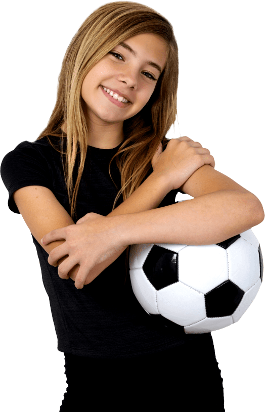 Win Orthodontics - Young teen girl holding a soccer ball smiling